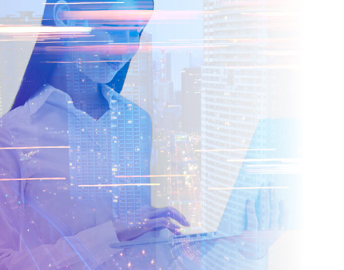 A woman holding a laptop overlayed on a transparent image of a busy city.